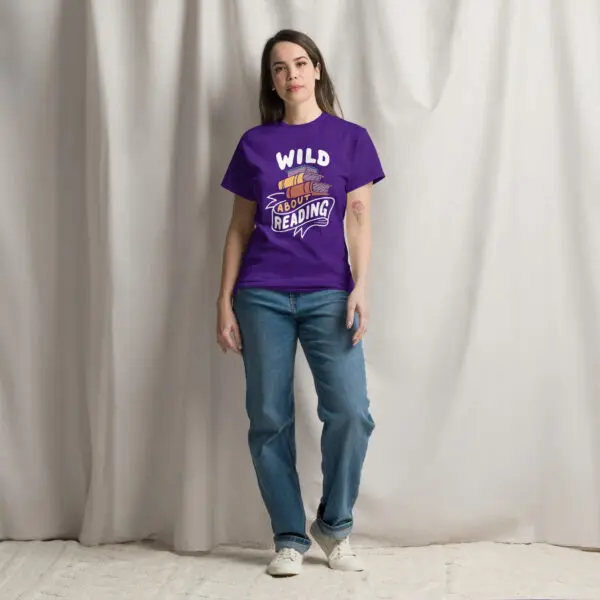 Wild About Reading book lover t-shirt in purple, worn by a model